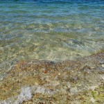 Wasser rauscht ans Ufer von Sanibel Island in Florida