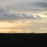 Spaziergänger am Strand von Norden