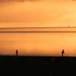 Das letzte Sonnenlicht über der Nordsee in Norden